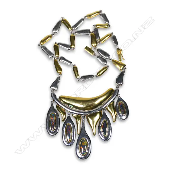 A 1950's retro style gold plated silver and black opal designer necklace,