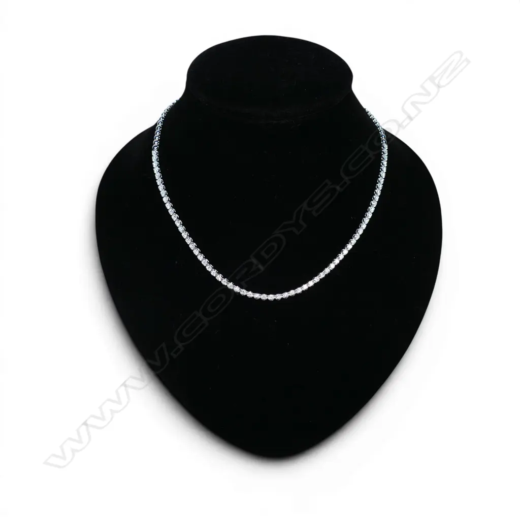 An 18ct white gold and diamond necklace, Image 1++