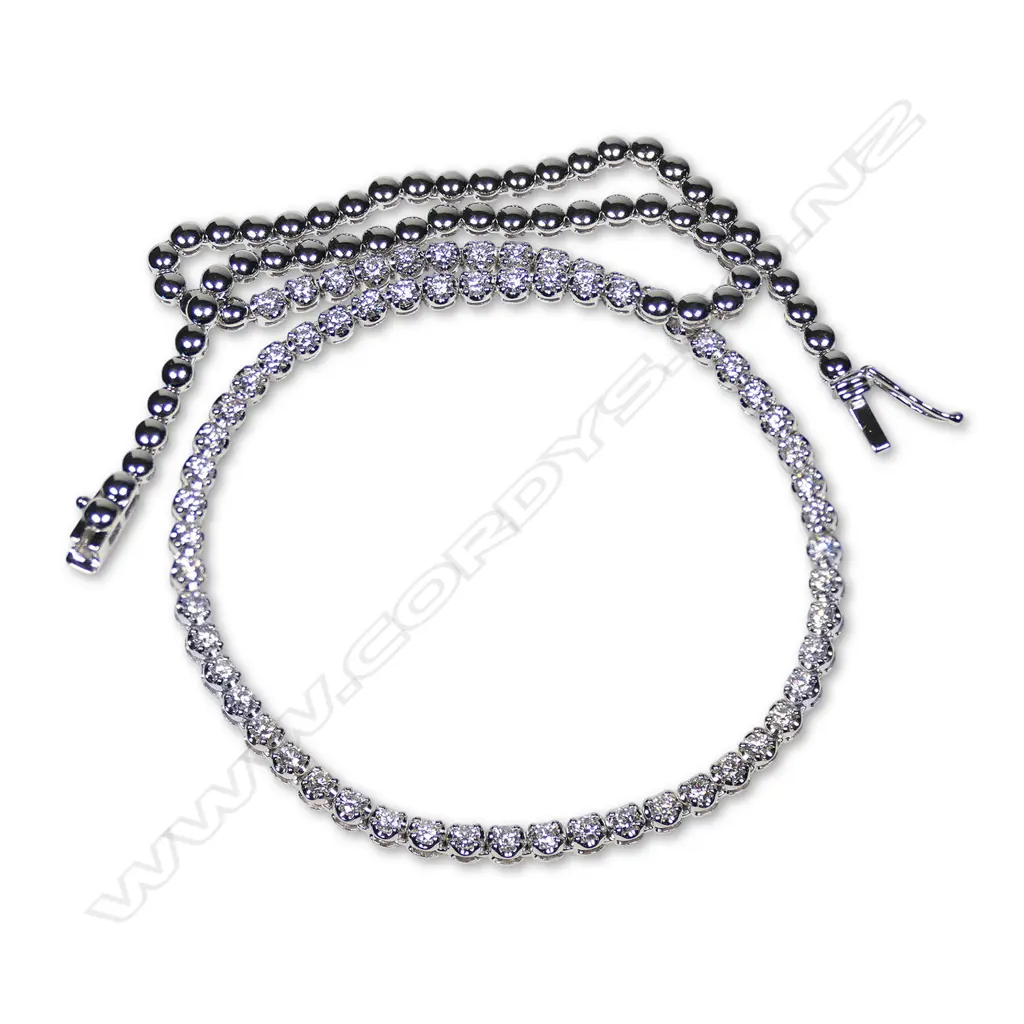 An 18ct white gold and diamond necklace, Image 1++