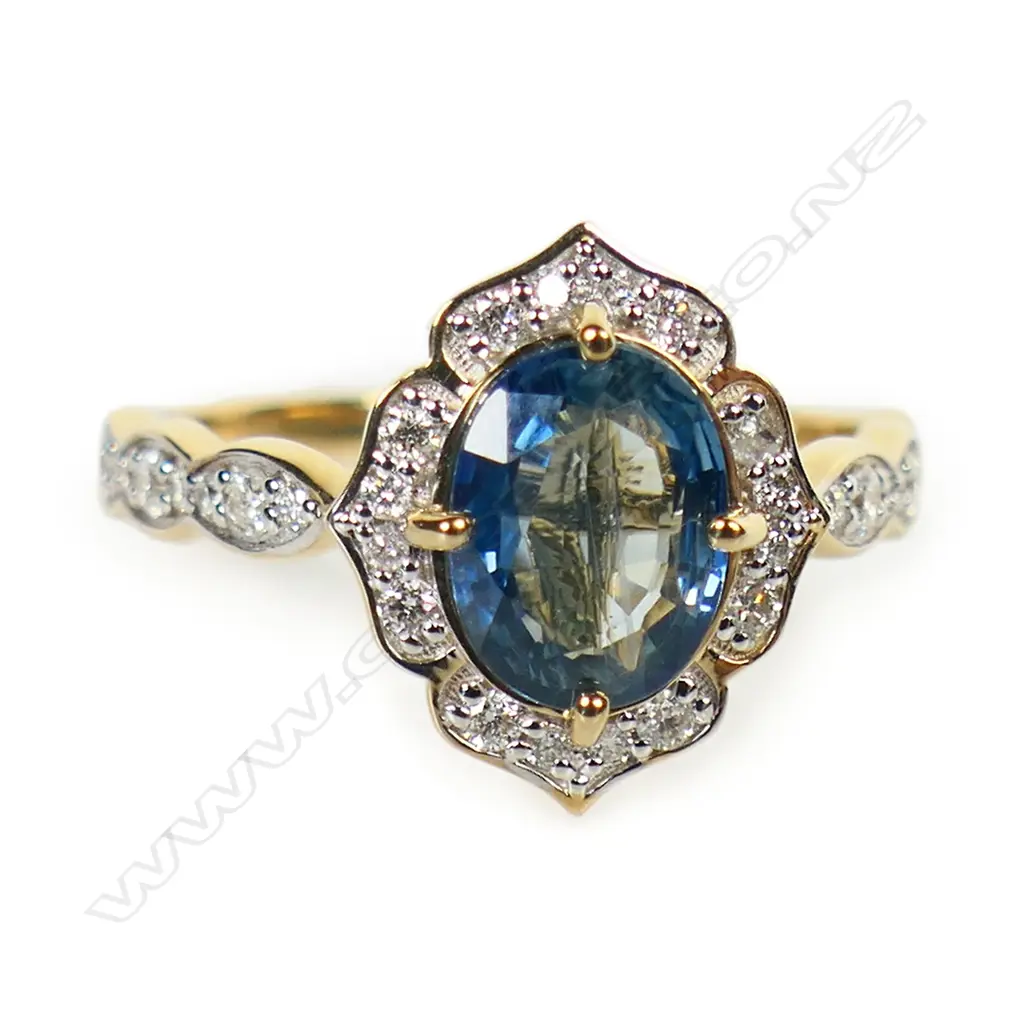 A 14ct gold diamond and sapphire dress ring, Image 1++