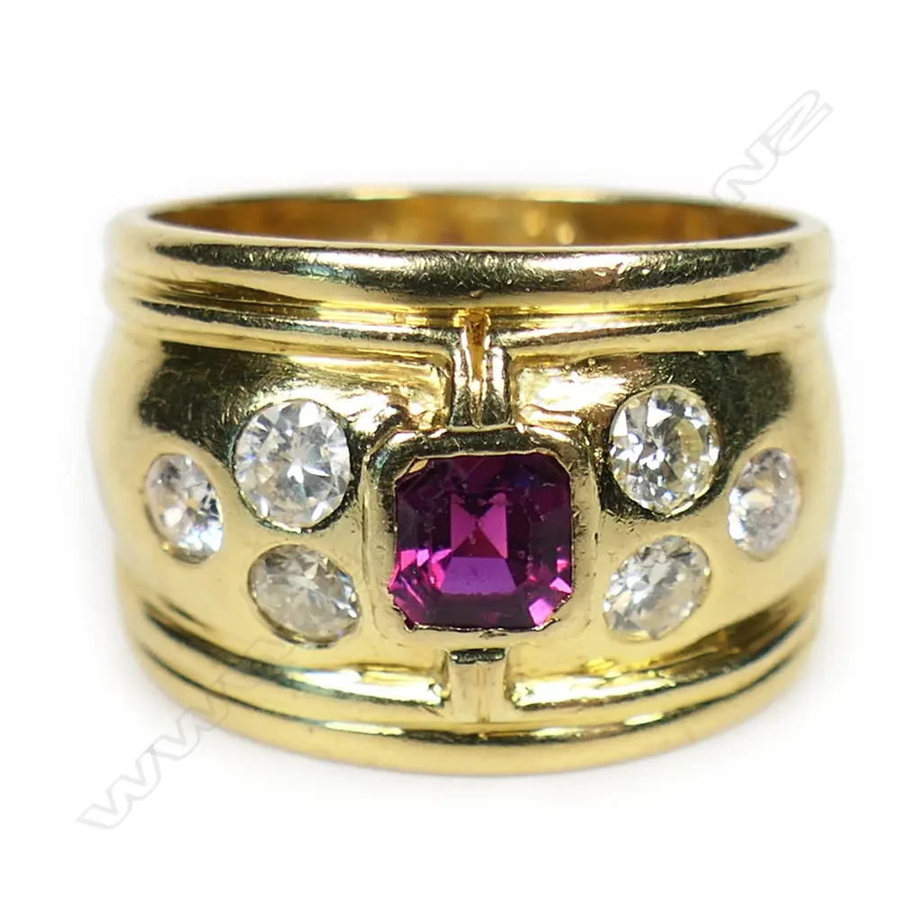 An 18ct gold diamond and ruby dress ring, Image 1++