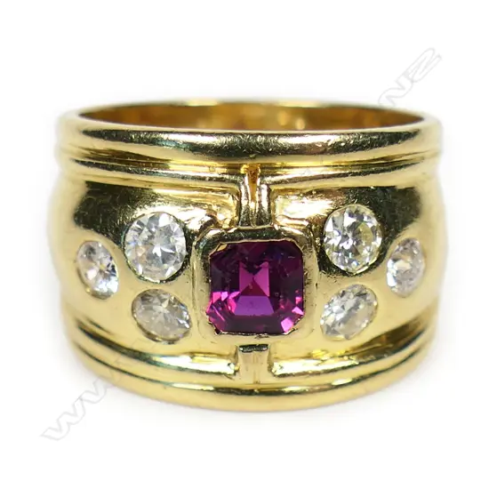 An 18ct gold diamond and ruby dress ring,