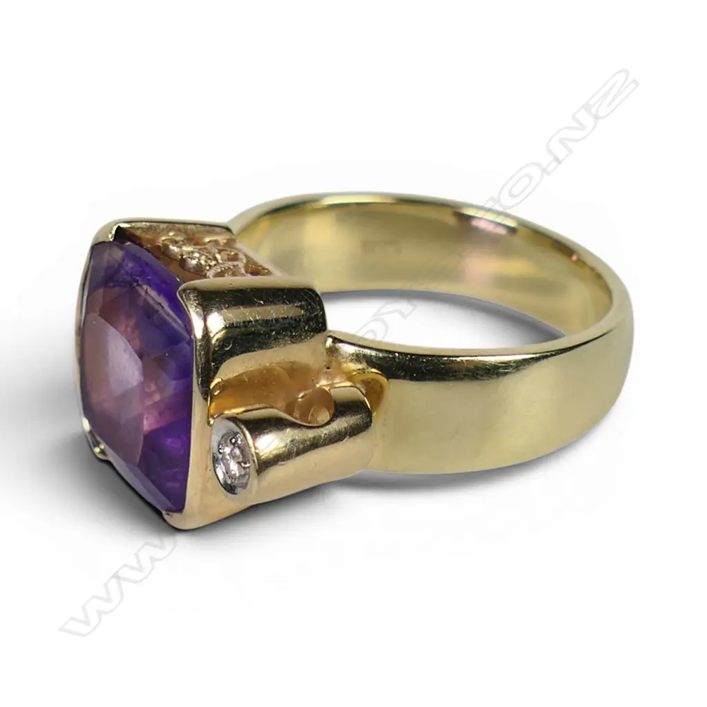 A 14ct gold amethyst and diamond contemporary dress ring, Image 1++