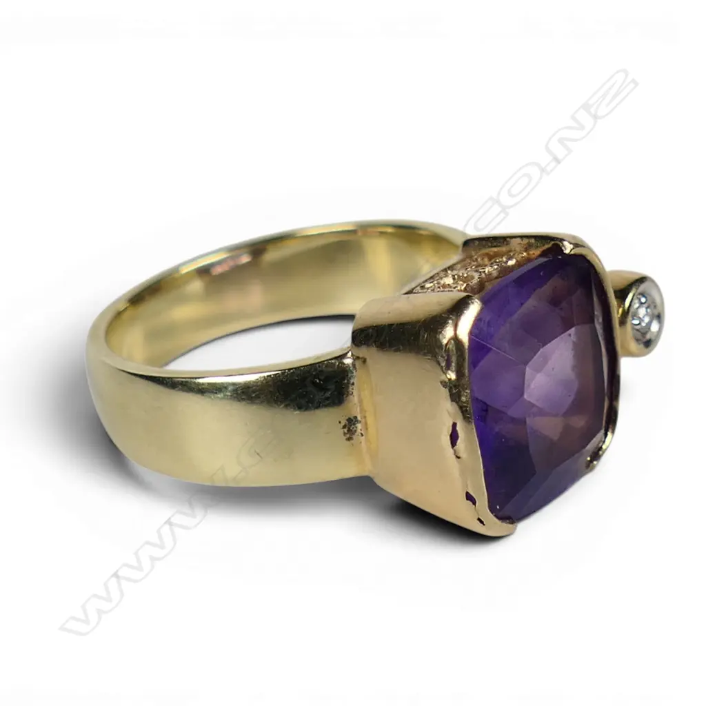 A 14ct gold amethyst and diamond contemporary dress ring, Image 1++