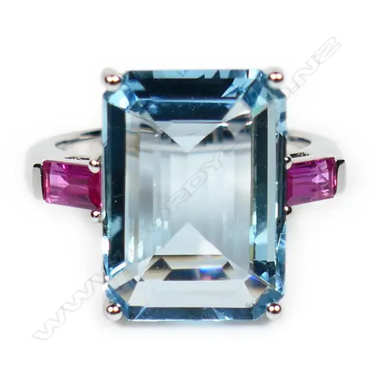An 18ct white gold aquamarine and ruby ring,