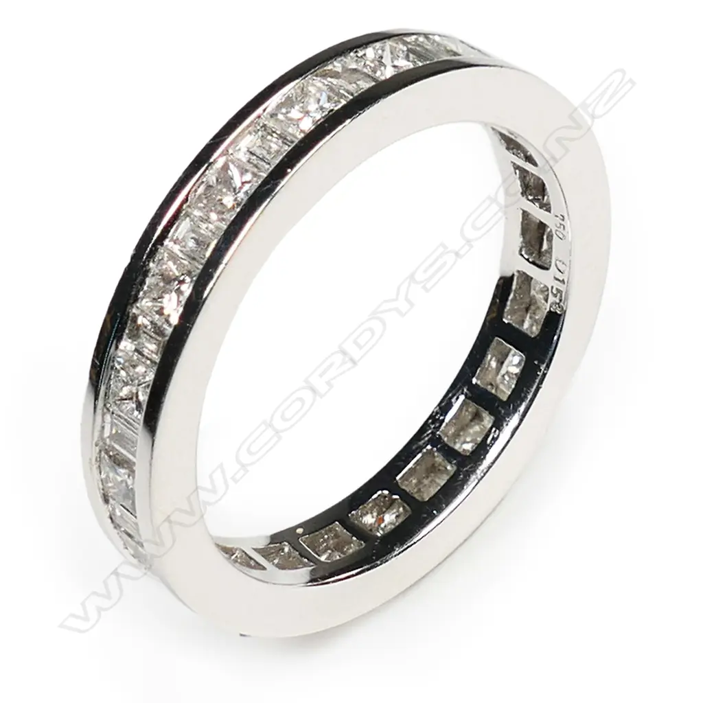An 18ct white gold and diamond eternity band, Image 1++