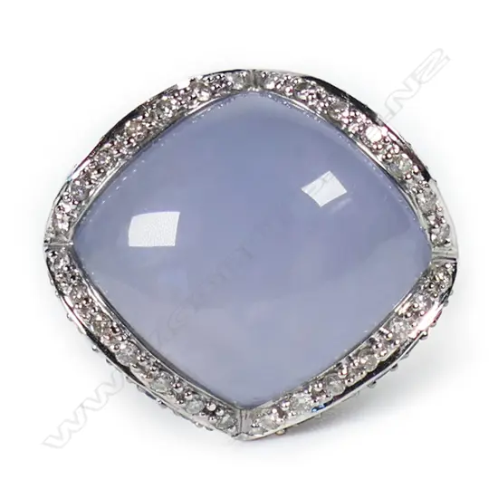 An 18ct white gold lavender jade sapphire and diamond ring,