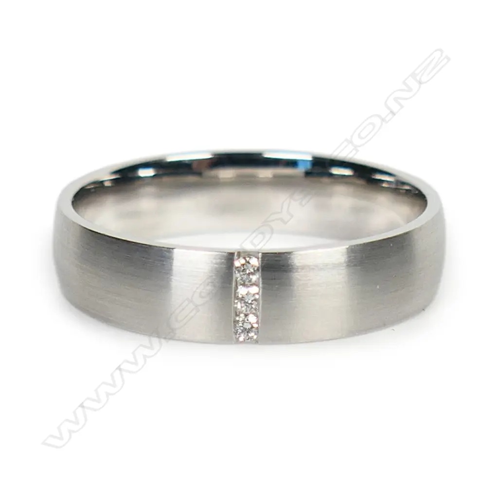 An 18ct white gold and diamond band, Image 1++