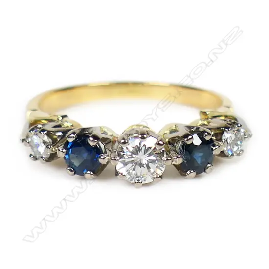 An 18ct yellow and white gold sapphire and diamond ring,