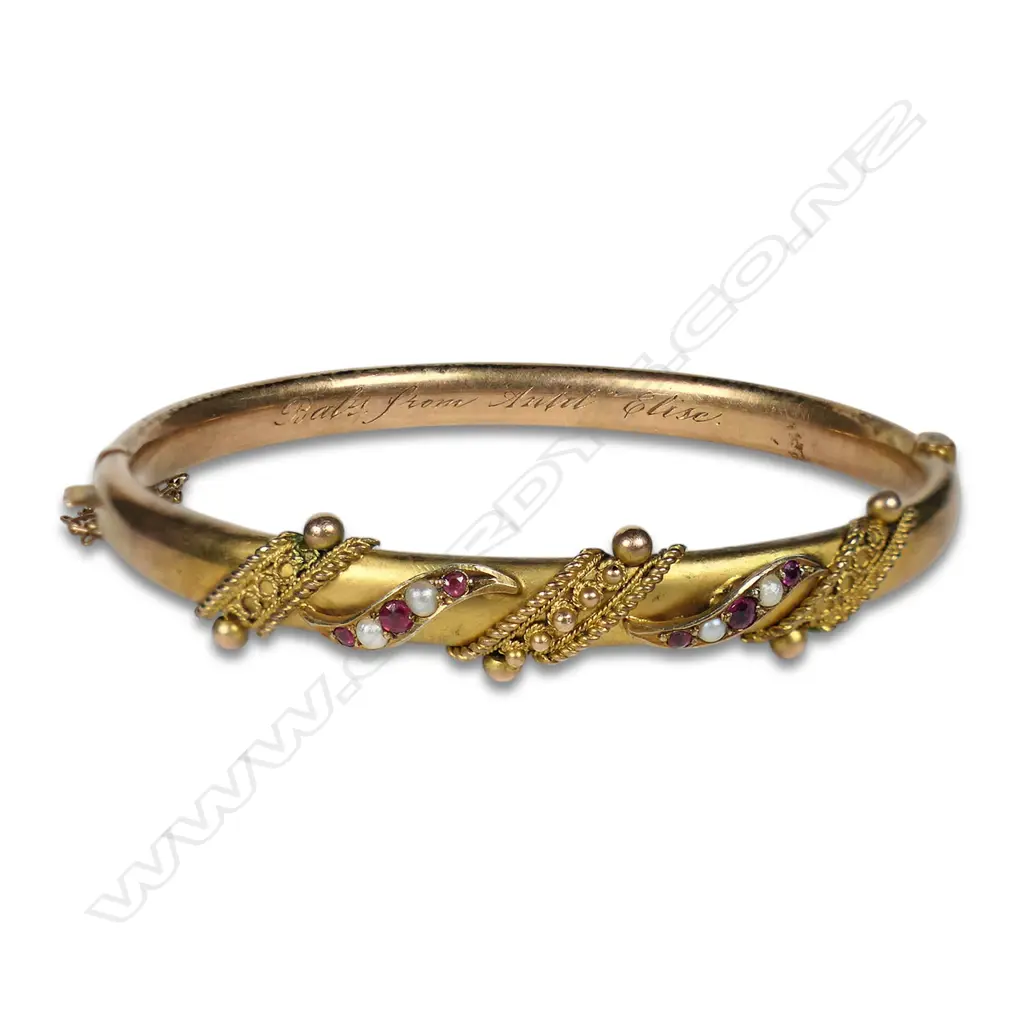 Edwardian 9ct gold ruby and seed pearl hinged bangle, Image 1++