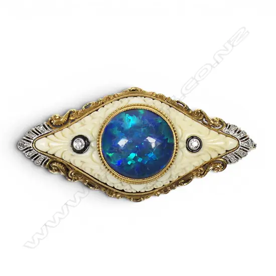 An 18ct gold Dutch 1950's designer ivory opal and diamond brooch,