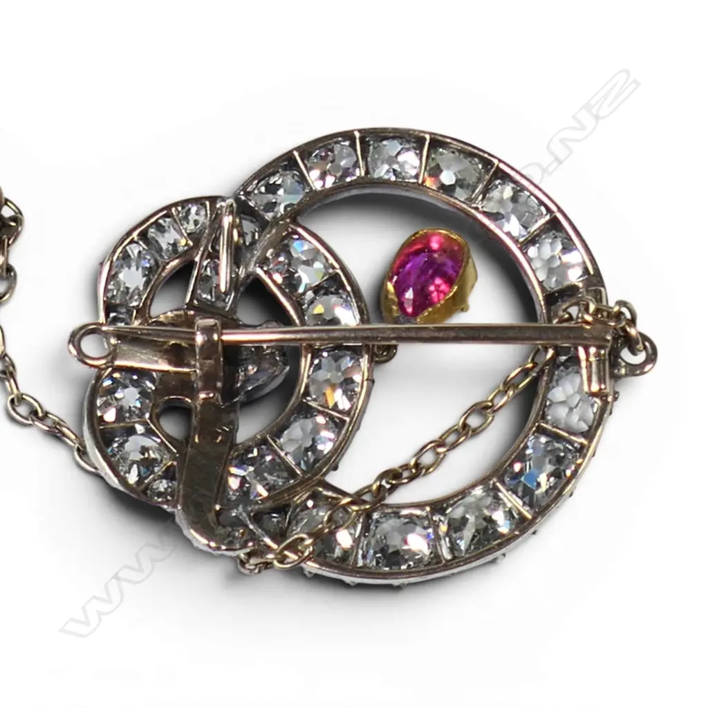 A Victorian 20ct and 9ct gold and silver diamond and pink sapphire snake brooch, Image 1++
