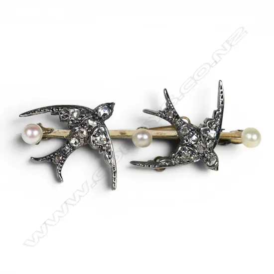 An estate 9ct gold diamond and pearl swallow bar brooch,