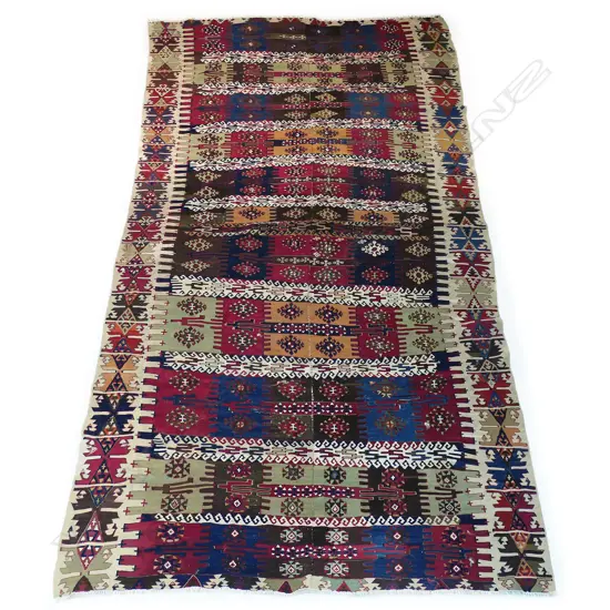 An old hand-woven Turkish kilim runner,