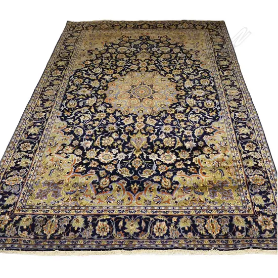An impressive hand-knotted Kashan carpet,