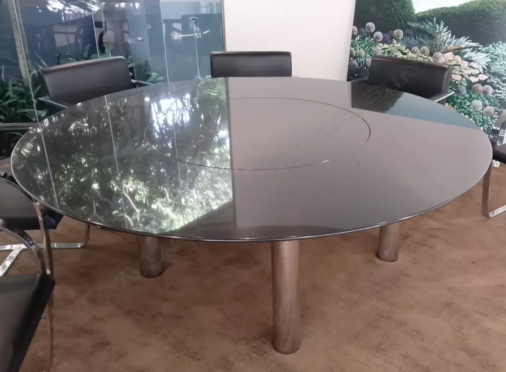 A modern designer circular granite dining table Image 1++