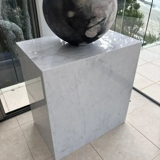 A contemporary marble plinth