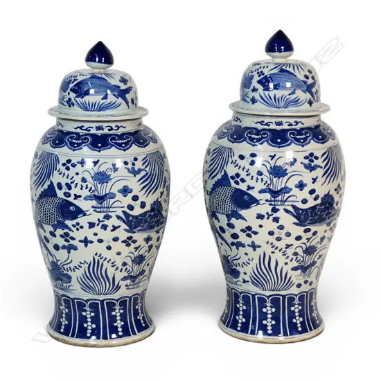 A pair of large Chinese blue and white porcelain lidded floor vases,