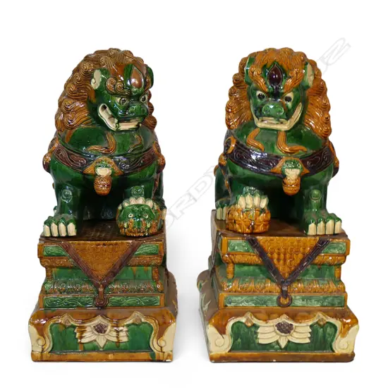 A pair of large vintage Chinese sancai glazed fu dogs on stands,
