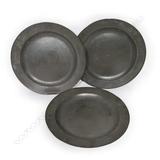 Three 18thC pewter chargers,