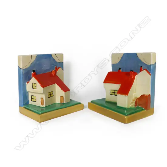A pair of A.J. Wilkinson Ltd. 'Clarice Cliff Cottage Bookends',