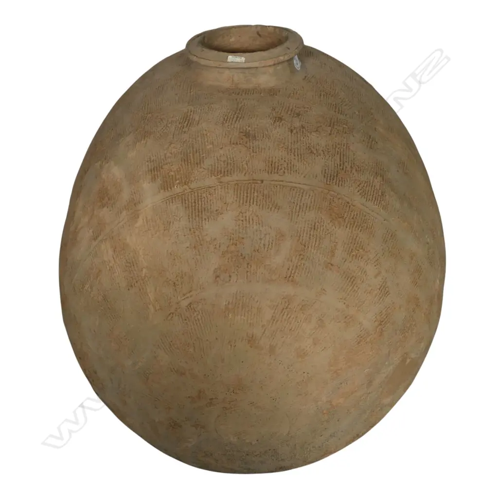A reputedly rare and substantial Warring States Period (475-221 B.C) cocoon jar, Image 1++