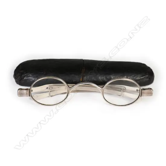 An uncommon pair of George IV silver mounted spectacles,