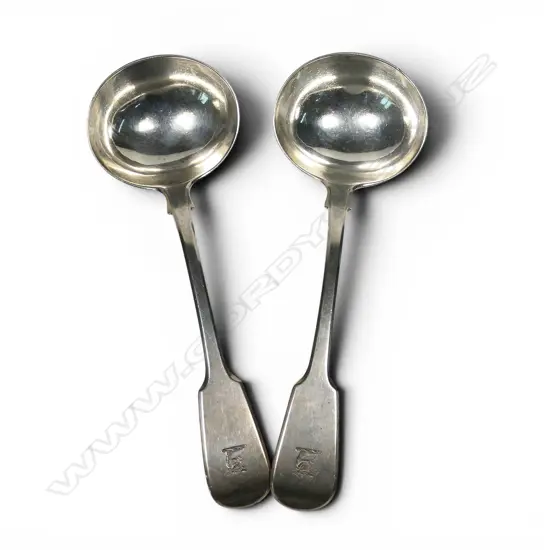 A pair of George IV silver fiddle pattern sauce ladles,