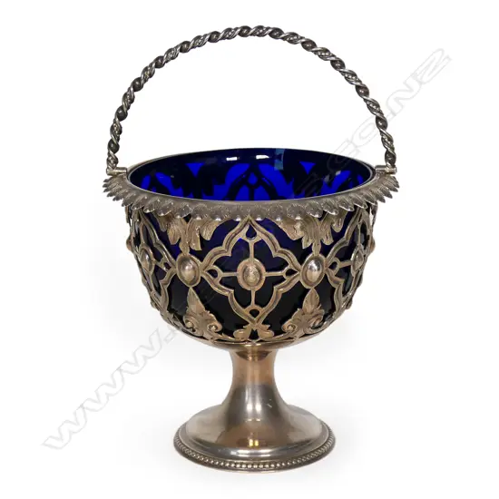 A Victorian silver sugar basket,
