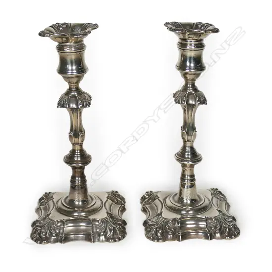 A pair of William IV silver column candlesticks,
