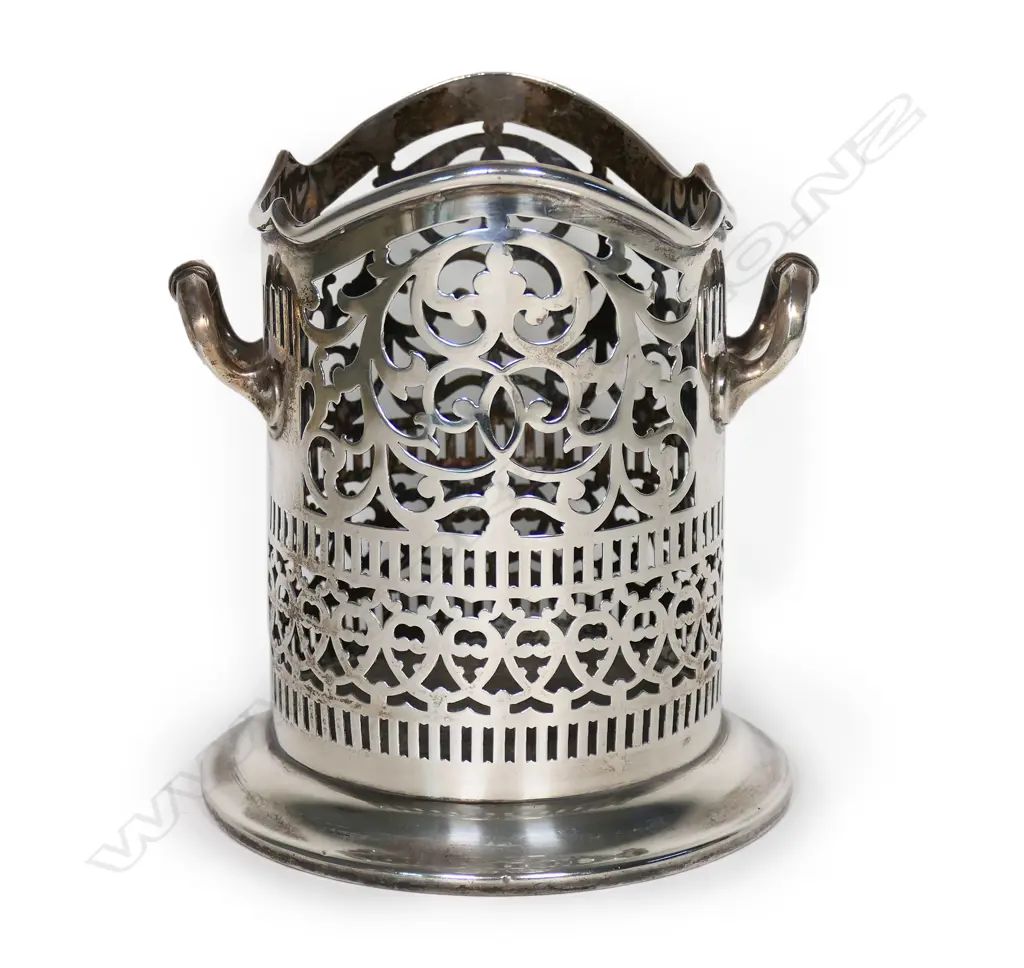 An early 1900s silver wine bottle holder, Image 1++