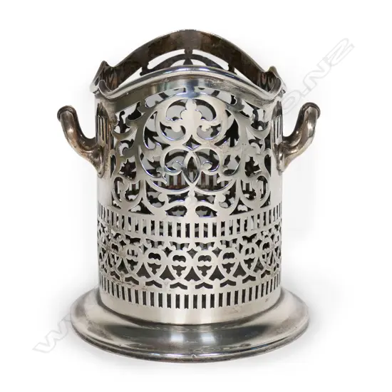 An early 1900s silver wine bottle holder,