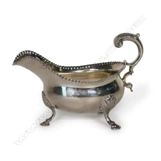 A George III silver fat belly sauce boat,
