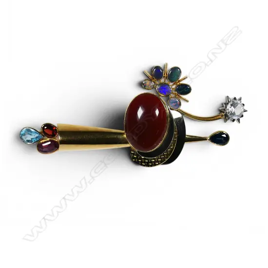 An 18ct yellow and white gold designer brooch,