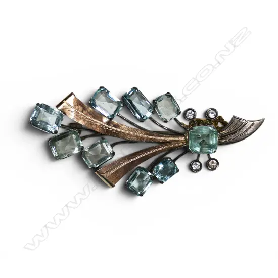 A vintage 9ct gold and silver aquamarine and diamond brooch,