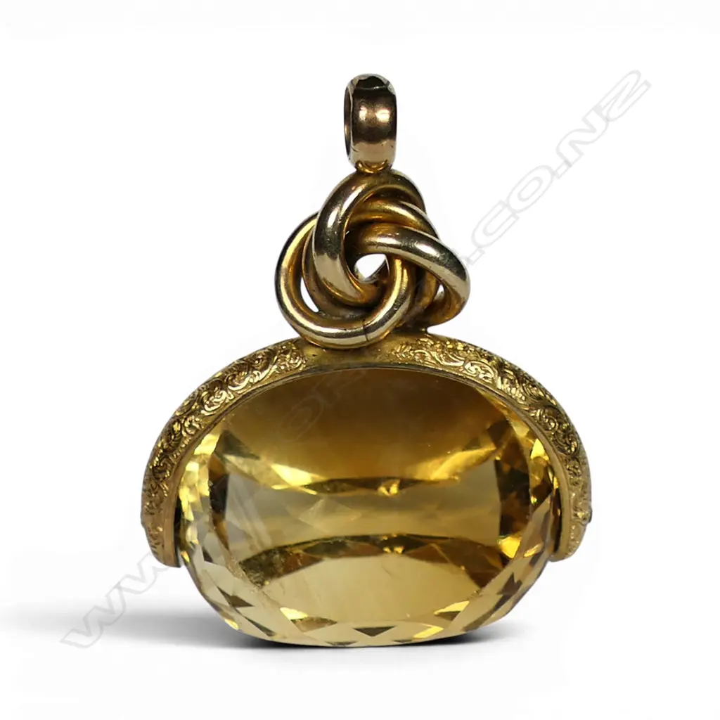 A large late 19thC 9ct gold and citrine fob spinner, Image 1++