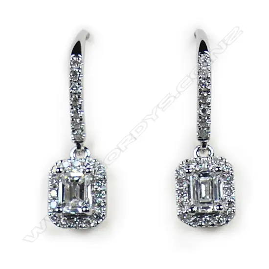 A pair of 18ct white gold and diamond earrings,