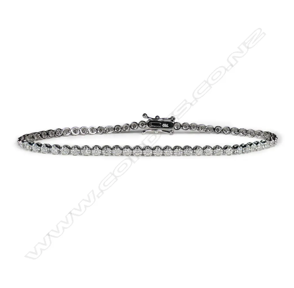 An 18ct white gold and diamond tennis bracelet, Image 1++
