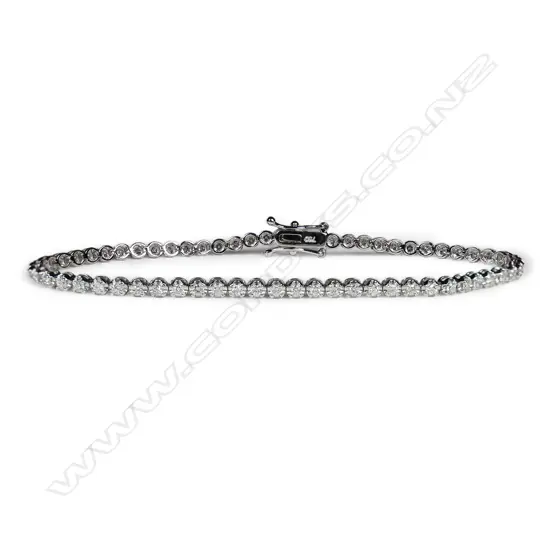 An 18ct white gold and diamond tennis bracelet,