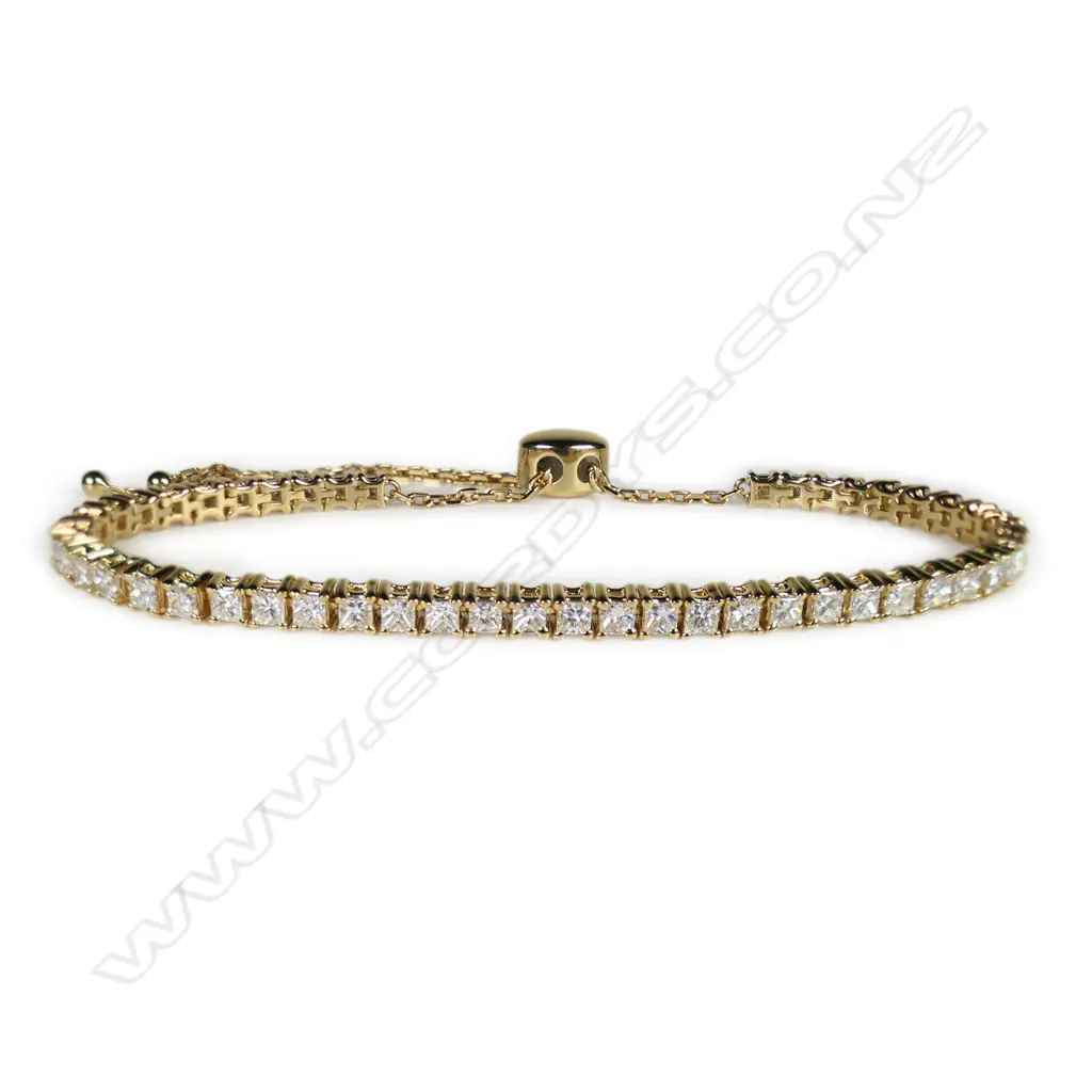 A 14ct gold and diamond bolo style tennis bracelet, Image 1++