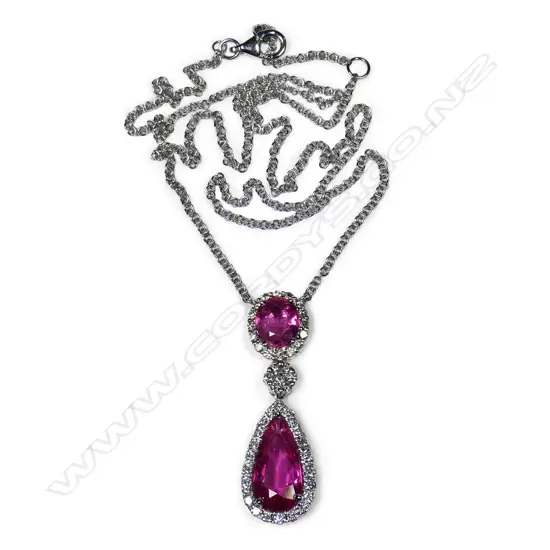 An 18ct white gold diamond and pink tourmaline pendant necklace,