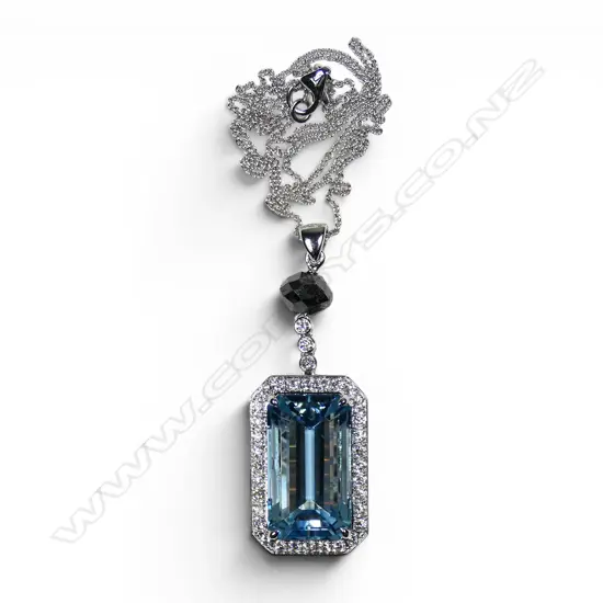 An 18ct white gold aquamarine and diamond pendant necklace,