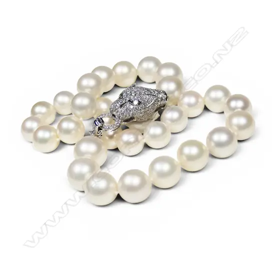 An impressive 18ct white gold panther head clasp strand of large 'Burma' white pearls,