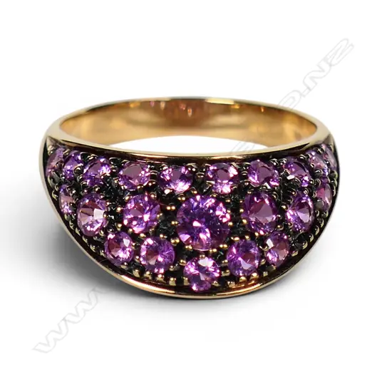 An 18ct rose gold and pink sapphire dress ring,