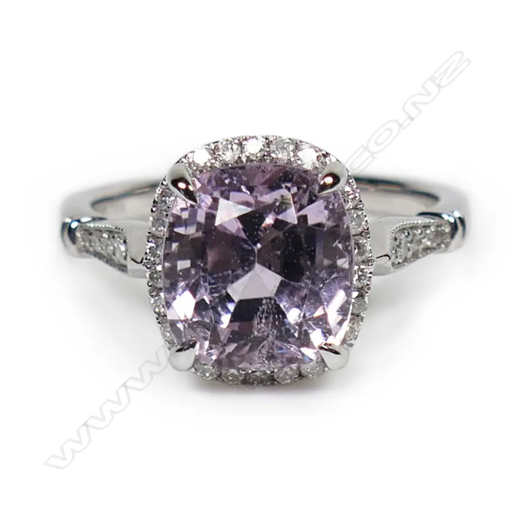 A 14ct white gold kunzite and diamond halo ring, Image 1++