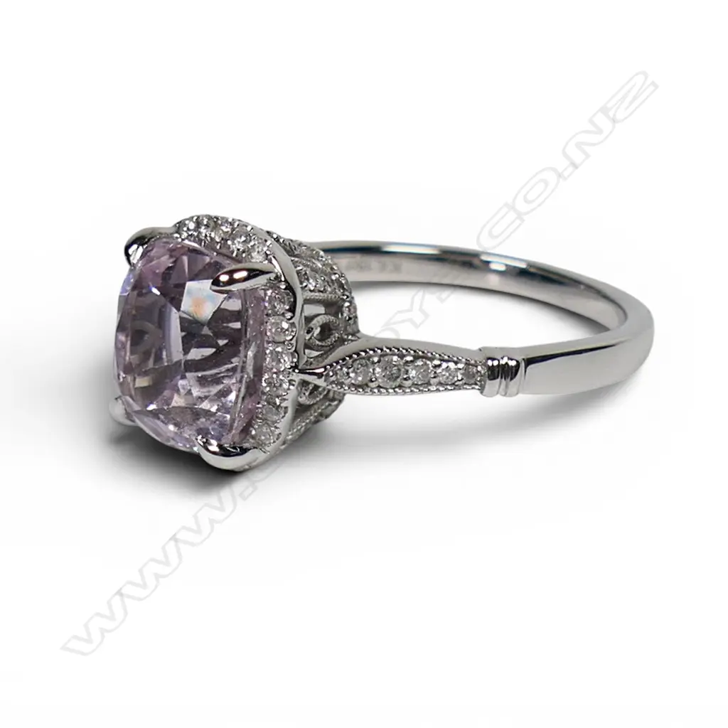 A 14ct white gold kunzite and diamond halo ring, Image 1++