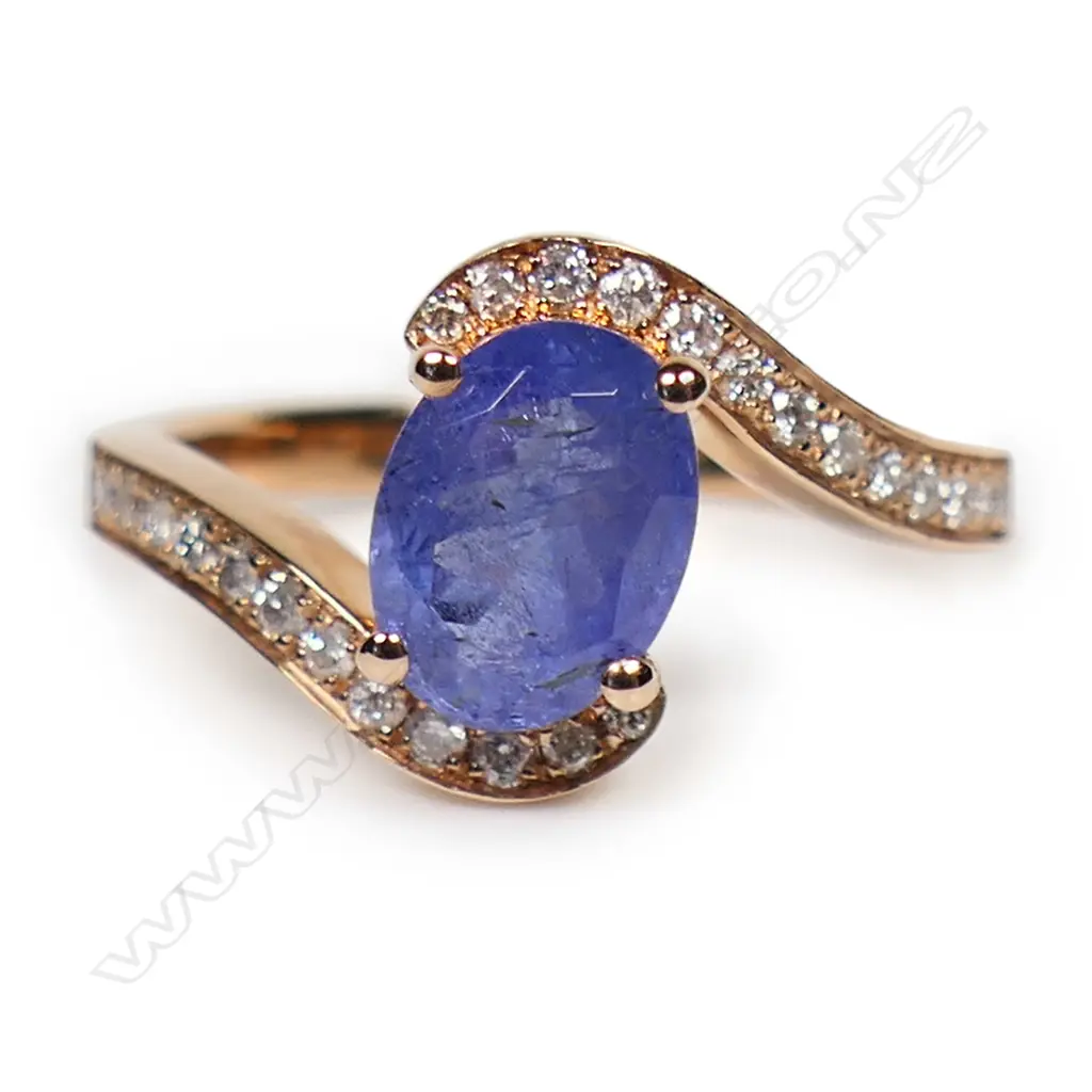 A 14ct rose gold tanzanite and diamond ring, Image 1++