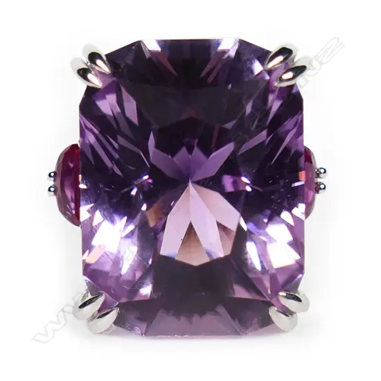 An impressive 18ct white gold large pink beryl diamond and ruby ring,