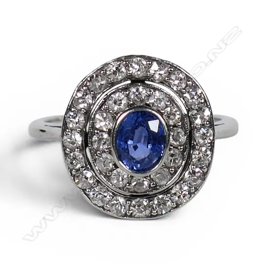 A platinum diamond and sapphire dress ring,