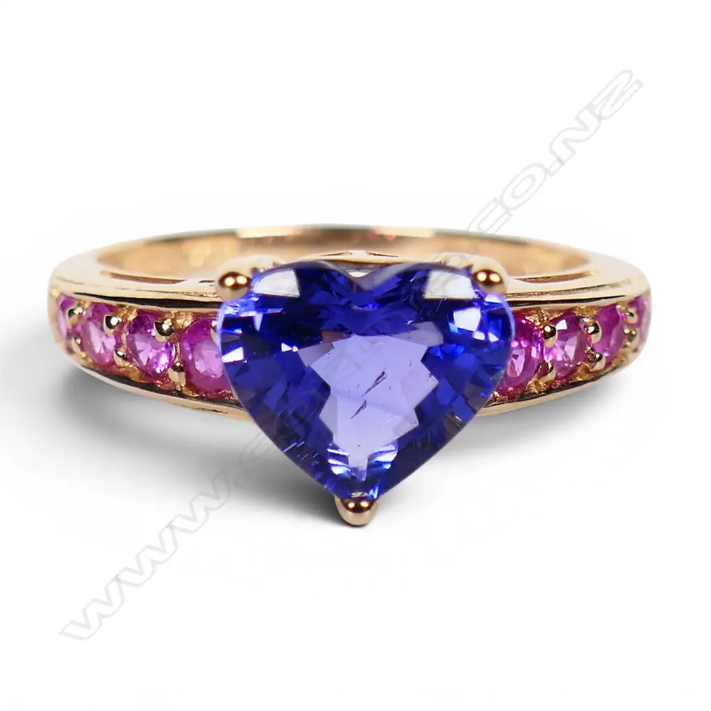 A 14ct rose gold tanzanite and ruby ring, Image 1++
